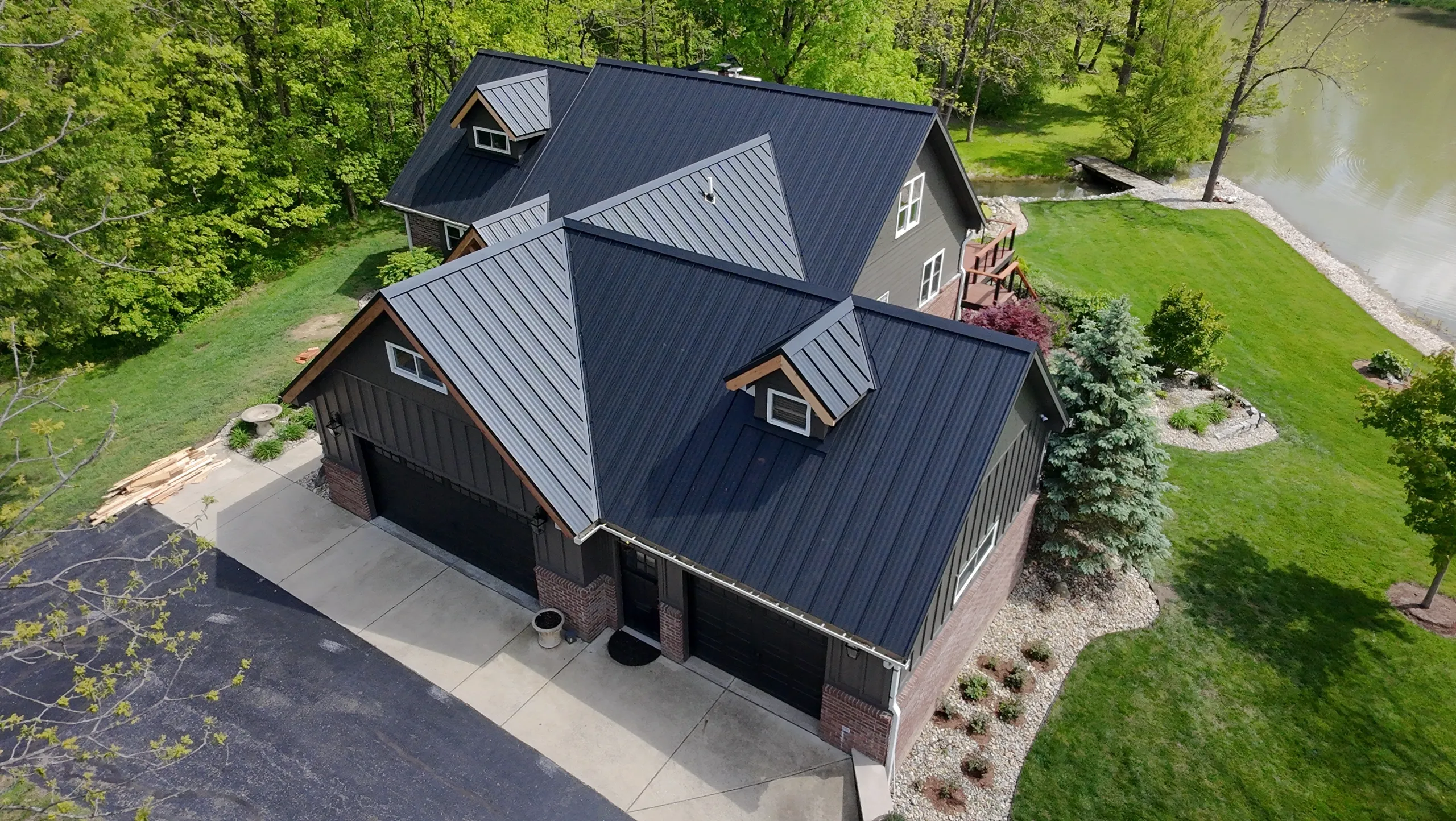 Home on lake with a 1.5" metal standing seam roof.